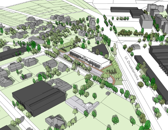 model 3D. Wizualizacja przedstawia widok z góry. Bryły istniejącej zabudowy, w centalnej części biała bryła projektowanej zabudowy. Kolorem zielonym podkreślono tereny zieleni i drzewa.