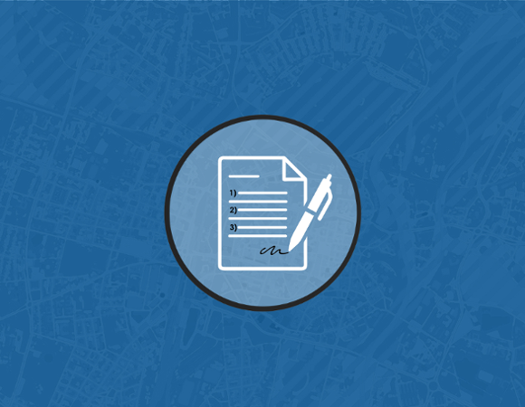 Na granatowym tle grafika kartki papieru